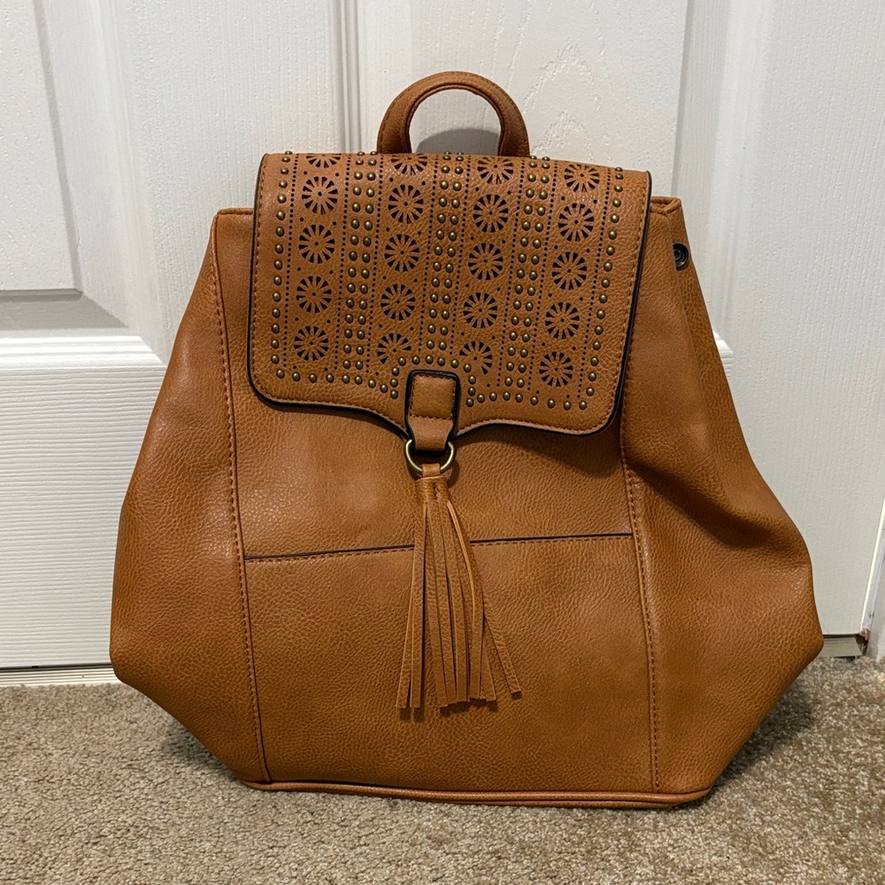 Elegant Tan Leather Backpack with Cut-Out Design